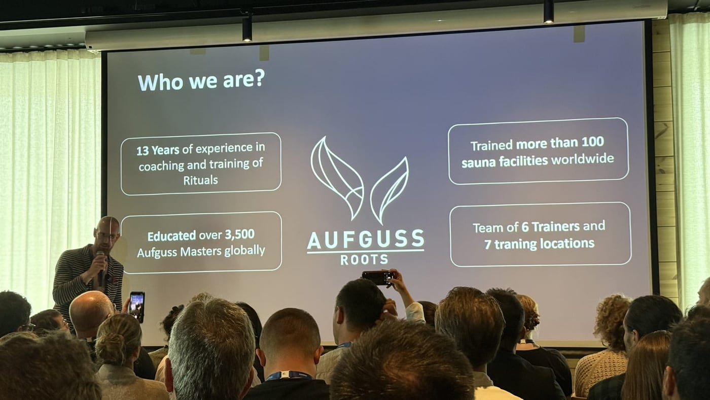 Diapositiva de Aufguss Roots con datos de formación de maestros, World Sauna Forum 2025